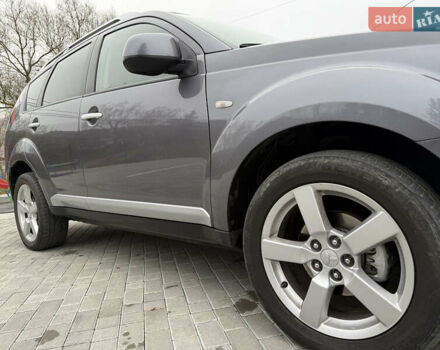 Серый Мицубиси Аутлендер, объемом двигателя 2.2 л и пробегом 162 тыс. км за 10000 $, фото 17 на Automoto.ua