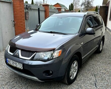 Серый Мицубиси Аутлендер, объемом двигателя 2.4 л и пробегом 153 тыс. км за 11500 $, фото 1 на Automoto.ua