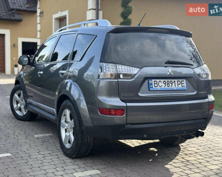 Серый Мицубиси Аутлендер, объемом двигателя 1.97 л и пробегом 242 тыс. км за 8999 $, фото 1 на Automoto.ua