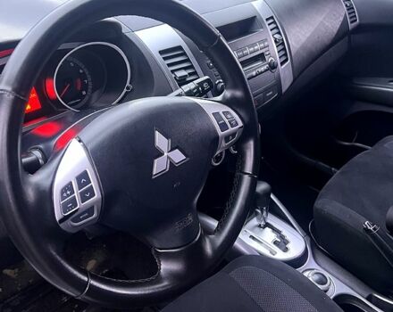 Серый Мицубиси Аутлендер, объемом двигателя 2.4 л и пробегом 241 тыс. км за 8200 $, фото 10 на Automoto.ua