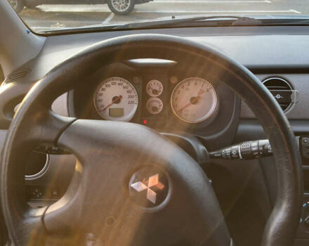 Серый Мицубиси Аутлендер, объемом двигателя 2 л и пробегом 138 тыс. км за 7000 $, фото 25 на Automoto.ua