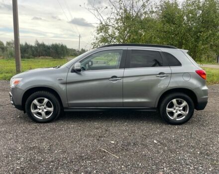 Серый Мицубиси Аутлендер, объемом двигателя 2 л и пробегом 180 тыс. км за 5313 $, фото 1 на Automoto.ua