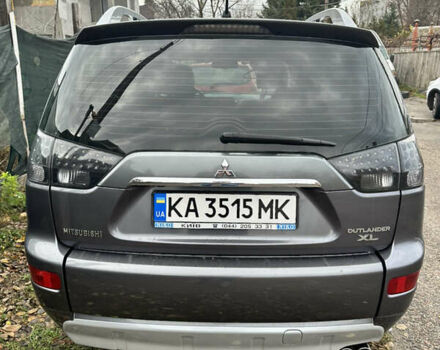 Серый Мицубиси Аутлендер, объемом двигателя 3 л и пробегом 279 тыс. км за 11300 $, фото 3 на Automoto.ua