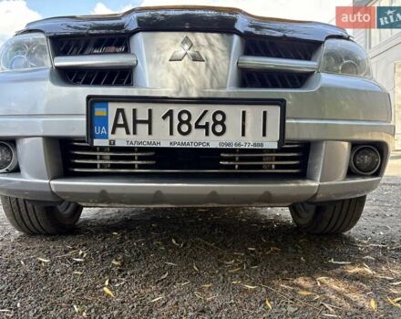 Сірий Міцубісі Аутлендер, об'ємом двигуна 2.38 л та пробігом 127 тис. км за 9999 $, фото 1 на Automoto.ua