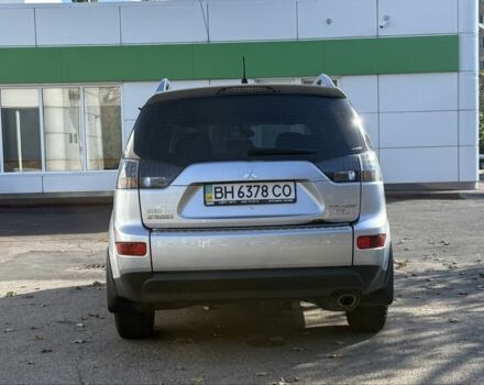 Серый Мицубиси Аутлендер, объемом двигателя 2.4 л и пробегом 43 тыс. км за 9500 $, фото 3 на Automoto.ua