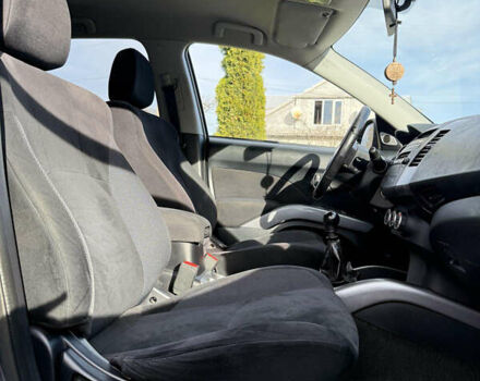 Серый Мицубиси Аутлендер, объемом двигателя 1.97 л и пробегом 242 тыс. км за 8999 $, фото 7 на Automoto.ua