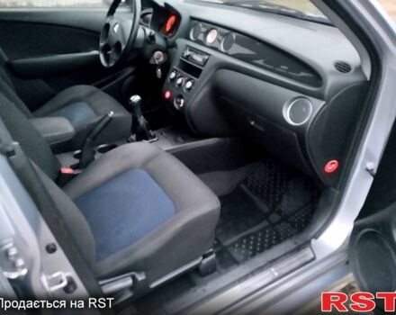 Серый Мицубиси Аутлендер, объемом двигателя 2 л и пробегом 198 тыс. км за 7700 $, фото 10 на Automoto.ua