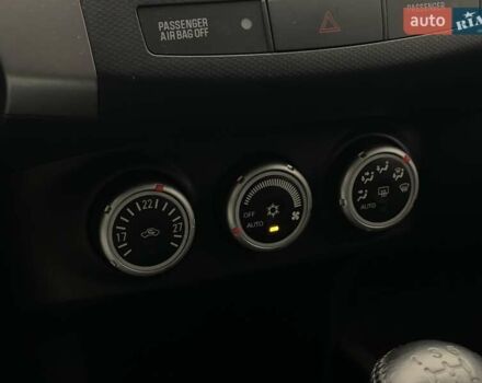 Сірий Міцубісі Аутлендер, об'ємом двигуна 2.4 л та пробігом 74 тис. км за 10676 $, фото 13 на Automoto.ua