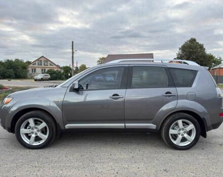 Серый Мицубиси Аутлендер, объемом двигателя 2.4 л и пробегом 171 тыс. км за 9199 $, фото 4 на Automoto.ua