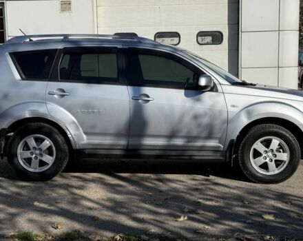 Серый Мицубиси Аутлендер, объемом двигателя 2.4 л и пробегом 43 тыс. км за 9500 $, фото 2 на Automoto.ua