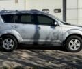 Серый Мицубиси Аутлендер, объемом двигателя 2.4 л и пробегом 43 тыс. км за 9500 $, фото 2 на Automoto.ua