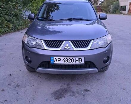 Серый Мицубиси Аутлендер, объемом двигателя 2 л и пробегом 275 тыс. км за 8000 $, фото 1 на Automoto.ua