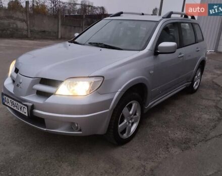 Сірий Міцубісі Аутлендер, об'ємом двигуна 2 л та пробігом 199 тис. км за 7600 $, фото 1 на Automoto.ua