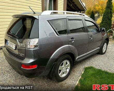Серый Мицубиси Аутлендер, объемом двигателя 2.4 л и пробегом 153 тыс. км за 11500 $, фото 3 на Automoto.ua