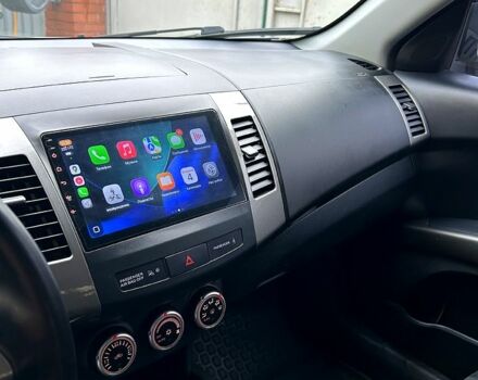 Серый Мицубиси Аутлендер, объемом двигателя 2.4 л и пробегом 153 тыс. км за 11500 $, фото 7 на Automoto.ua