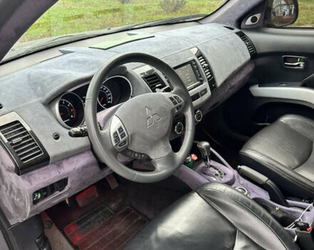 Серый Мицубиси Аутлендер, объемом двигателя 3 л и пробегом 279 тыс. км за 11300 $, фото 31 на Automoto.ua