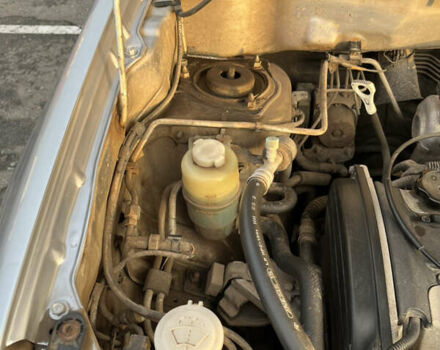 Серый Мицубиси Аутлендер, объемом двигателя 2 л и пробегом 138 тыс. км за 7000 $, фото 29 на Automoto.ua