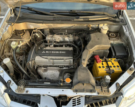 Серый Мицубиси Аутлендер, объемом двигателя 2 л и пробегом 138 тыс. км за 7000 $, фото 31 на Automoto.ua