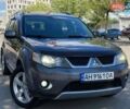 Серый Мицубиси Аутлендер, объемом двигателя 3 л и пробегом 177 тыс. км за 10800 $, фото 1 на Automoto.ua
