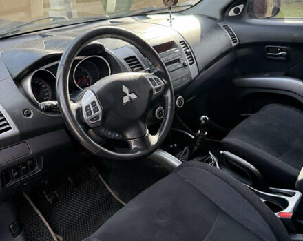 Серый Мицубиси Аутлендер, объемом двигателя 1.97 л и пробегом 242 тыс. км за 8999 $, фото 20 на Automoto.ua