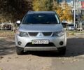 Серый Мицубиси Аутлендер, объемом двигателя 2.36 л и пробегом 45 тыс. км за 9500 $, фото 1 на Automoto.ua