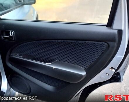 Серый Мицубиси Аутлендер, объемом двигателя 2 л и пробегом 198 тыс. км за 7700 $, фото 12 на Automoto.ua