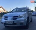 Сірий Міцубісі Аутлендер, об'ємом двигуна 2 л та пробігом 214 тис. км за 6200 $, фото 1 на Automoto.ua