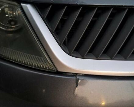 Серый Мицубиси Аутлендер, объемом двигателя 2 л и пробегом 275 тыс. км за 8000 $, фото 28 на Automoto.ua