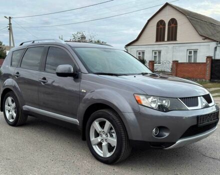 Серый Мицубиси Аутлендер, объемом двигателя 2.4 л и пробегом 171 тыс. км за 9199 $, фото 1 на Automoto.ua