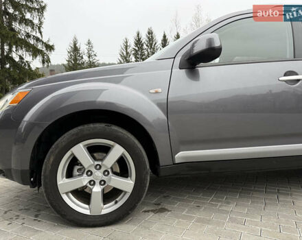 Серый Мицубиси Аутлендер, объемом двигателя 2.2 л и пробегом 162 тыс. км за 10000 $, фото 14 на Automoto.ua