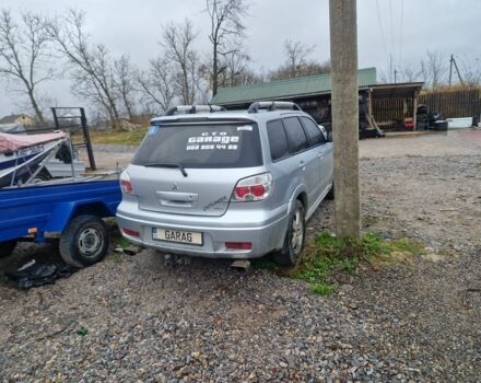 Серый Мицубиси Аутлендер, объемом двигателя 2.4 л и пробегом 350 тыс. км за 8000 $, фото 2 на Automoto.ua