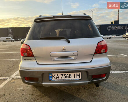 Серый Мицубиси Аутлендер, объемом двигателя 2 л и пробегом 138 тыс. км за 7000 $, фото 5 на Automoto.ua