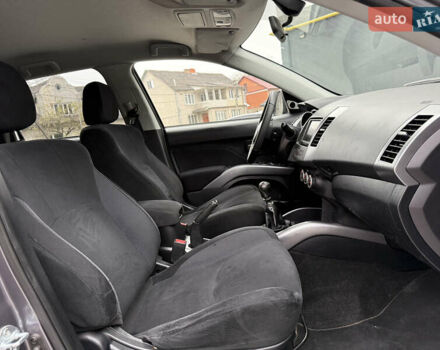 Серый Мицубиси Аутлендер, объемом двигателя 2.2 л и пробегом 162 тыс. км за 10000 $, фото 38 на Automoto.ua