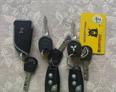 Сірий Міцубісі Аутлендер, об'ємом двигуна 2.38 л та пробігом 127 тис. км за 9999 $, фото 61 на Automoto.ua