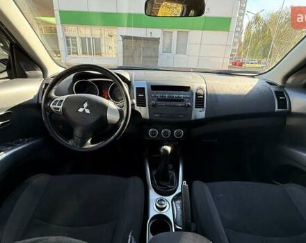 Серый Мицубиси Аутлендер, объемом двигателя 2.36 л и пробегом 45 тыс. км за 9500 $, фото 5 на Automoto.ua