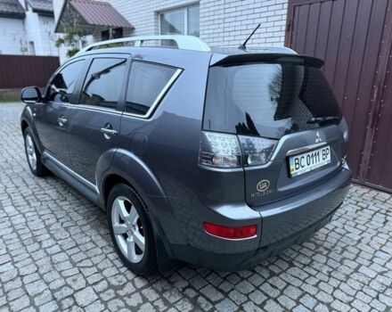 Серый Мицубиси Аутлендер, объемом двигателя 3 л и пробегом 132 тыс. км за 9600 $, фото 2 на Automoto.ua