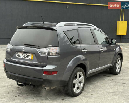 Серый Мицубиси Аутлендер, объемом двигателя 2.2 л и пробегом 162 тыс. км за 10000 $, фото 4 на Automoto.ua