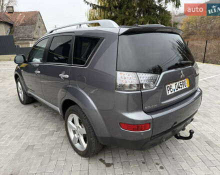 Серый Мицубиси Аутлендер, объемом двигателя 2.2 л и пробегом 162 тыс. км за 10000 $, фото 11 на Automoto.ua