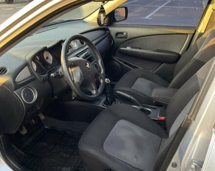 Серый Мицубиси Аутлендер, объемом двигателя 2 л и пробегом 138 тыс. км за 7000 $, фото 16 на Automoto.ua