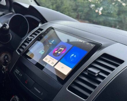 Серый Мицубиси Аутлендер, объемом двигателя 2.4 л и пробегом 171 тыс. км за 9199 $, фото 18 на Automoto.ua