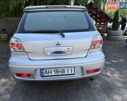 Сірий Міцубісі Аутлендер, об'ємом двигуна 2.38 л та пробігом 127 тис. км за 9999 $, фото 39 на Automoto.ua