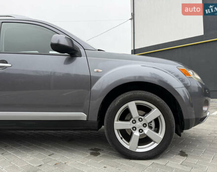 Серый Мицубиси Аутлендер, объемом двигателя 2.2 л и пробегом 162 тыс. км за 10000 $, фото 18 на Automoto.ua