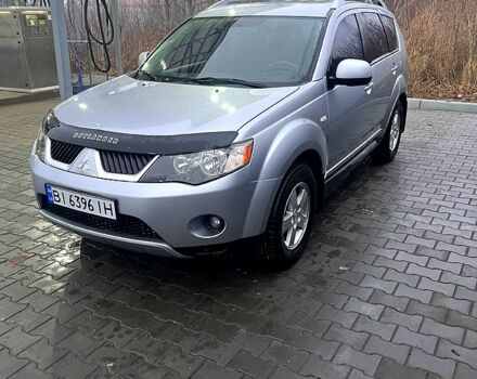 Серый Мицубиси Аутлендер, объемом двигателя 2.4 л и пробегом 241 тыс. км за 8200 $, фото 2 на Automoto.ua