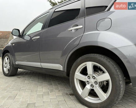 Серый Мицубиси Аутлендер, объемом двигателя 2.2 л и пробегом 162 тыс. км за 10000 $, фото 12 на Automoto.ua