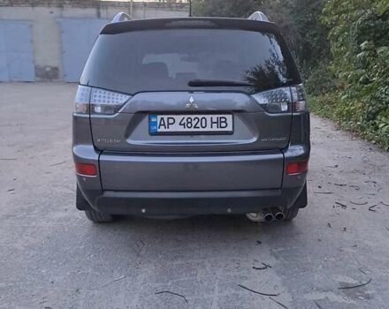 Серый Мицубиси Аутлендер, объемом двигателя 2 л и пробегом 275 тыс. км за 8000 $, фото 2 на Automoto.ua