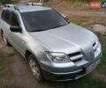 Серый Мицубиси Аутлендер, объемом двигателя 2 л и пробегом 215 тыс. км за 5900 $, фото 3 на Automoto.ua