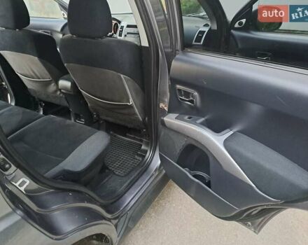 Серый Мицубиси Аутлендер, объемом двигателя 2 л и пробегом 275 тыс. км за 8000 $, фото 24 на Automoto.ua