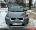 Серый Мицубиси Аутлендер, объемом двигателя 2.4 л и пробегом 204 тыс. км за 9900 $, фото 1 на Automoto.ua