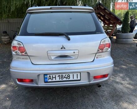Сірий Міцубісі Аутлендер, об'ємом двигуна 2.38 л та пробігом 127 тис. км за 9999 $, фото 37 на Automoto.ua