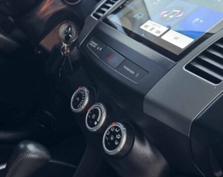 Серый Мицубиси Аутлендер, объемом двигателя 2.4 л и пробегом 171 тыс. км за 9199 $, фото 19 на Automoto.ua